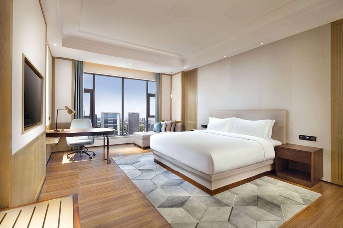 Imagen de la habitación del Hotel Ramada Plaza by Wyndham Dongguan Songshan Lake. Foto 4