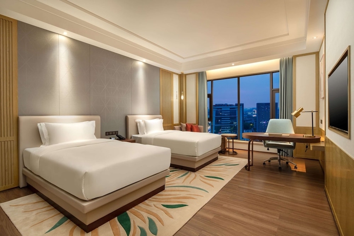 Imagen de la habitación del Hotel Ramada Plaza by Wyndham Dongguan Songshan Lake. Foto 7