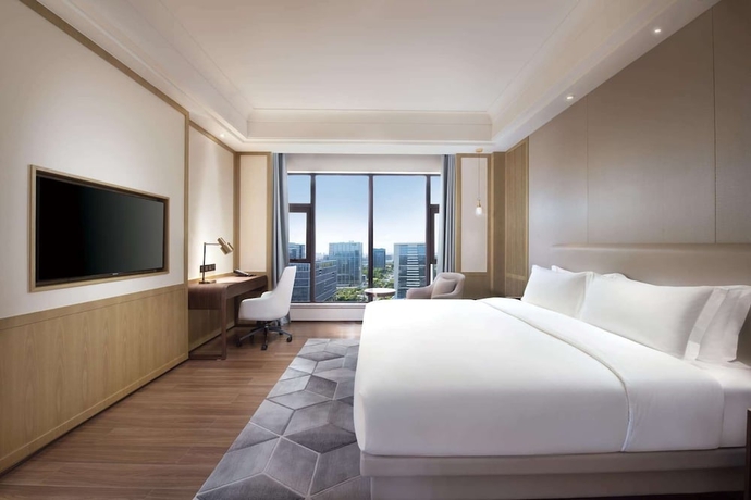 Imagen de la habitación del Hotel Ramada Plaza by Wyndham Dongguan Songshan Lake. Foto 10