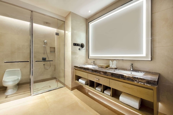 Imagen de la habitación del Hotel Ramada Plaza by Wyndham Dongguan Songshan Lake. Foto 14