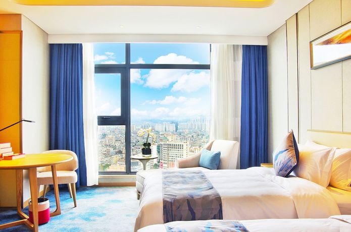 Imagen de la habitación del Hotel Ramada Plaza by Wyndham Dongxing City Center. Foto 2