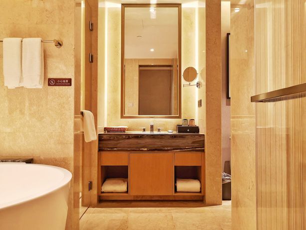 Imagen de la habitación del Hotel Ramada Plaza by Wyndham Dongxing City Center. Foto 4