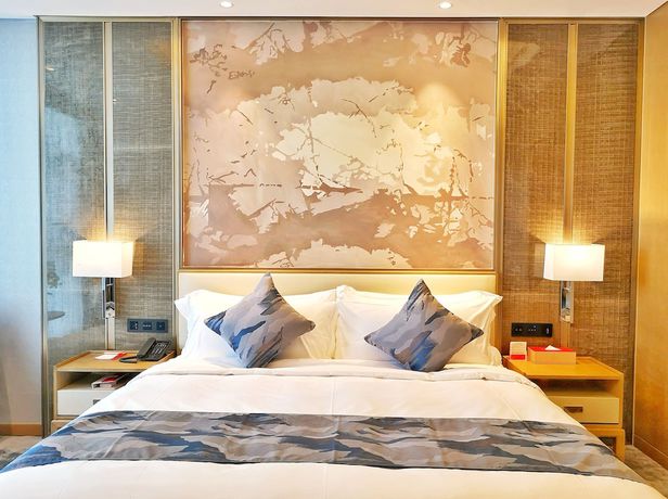 Imagen de la habitación del Hotel Ramada Plaza by Wyndham Dongxing City Center. Foto 5