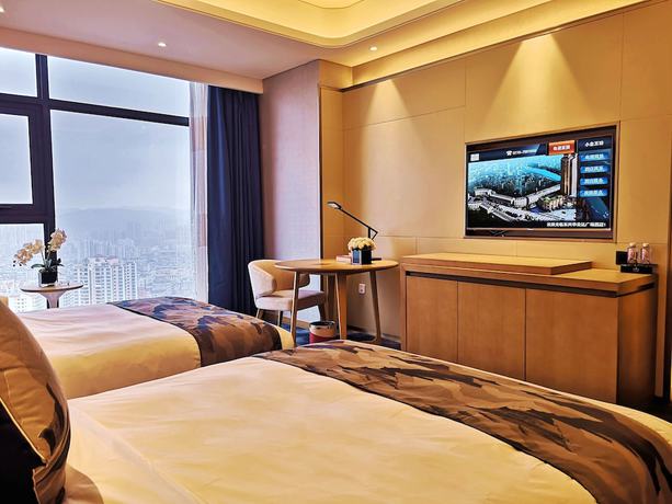 Imagen de la habitación del Hotel Ramada Plaza by Wyndham Dongxing City Center. Foto 9