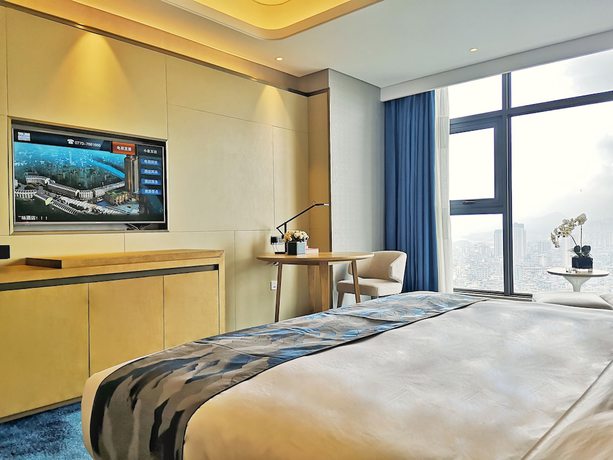 Imagen de la habitación del Hotel Ramada Plaza by Wyndham Dongxing City Center. Foto 13