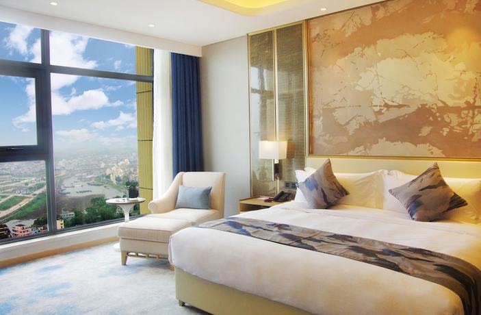 Imagen de la habitación del Hotel Ramada Plaza by Wyndham Dongxing City Center. Foto 14