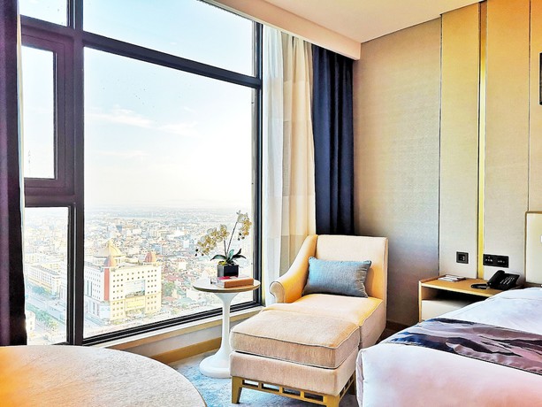 Imagen de la habitación del Hotel Ramada Plaza by Wyndham Dongxing City Center. Foto 16