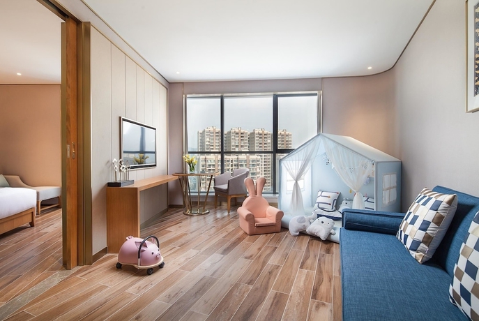 Imagen de la habitación del Hotel Ramada Plaza by Wyndham Fuxian Lake. Foto 9