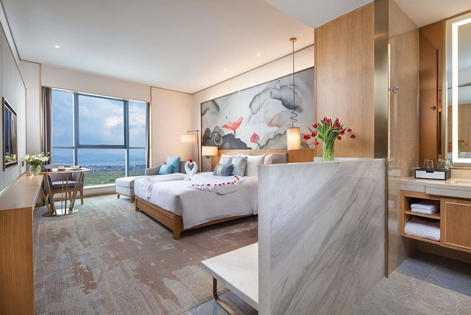 Imagen de la habitación del Hotel Ramada Plaza by Wyndham Fuxian Lake. Foto 10