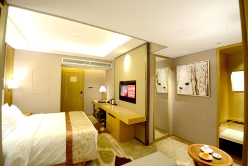 Imagen de la habitación del Hotel Ramada Plaza by Wyndham Fuzhou South. Foto 5