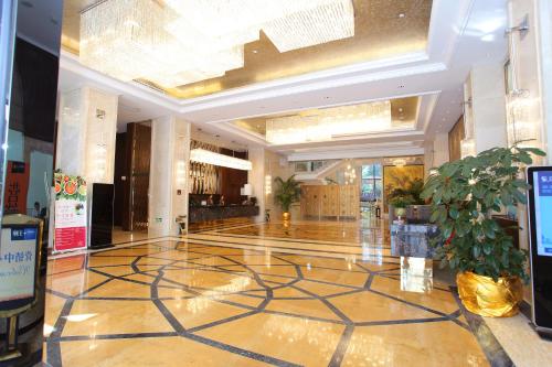 Imagen de los interiores del Hotel Ramada Plaza by Wyndham Fuzhou South. Foto 8