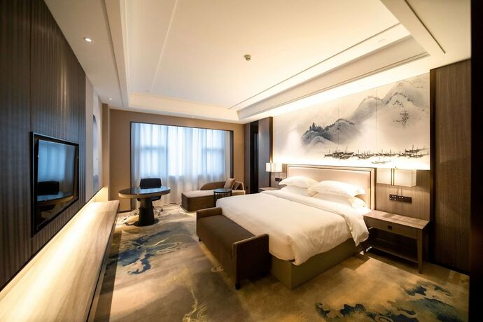 Imagen de la habitación del Hotel Ramada Plaza by Wyndham Hezhou North. Foto 5