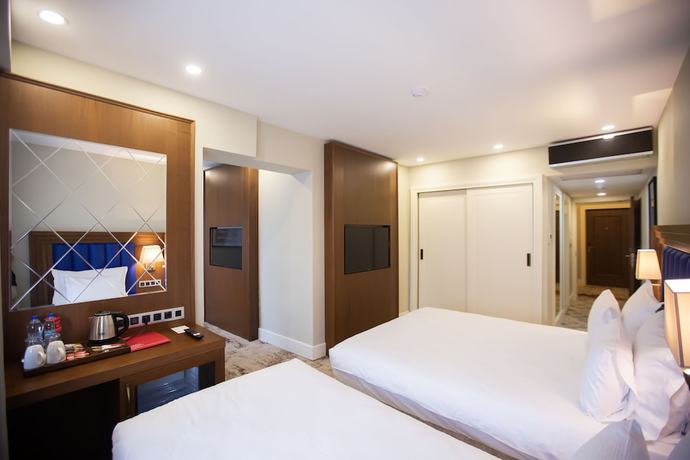 Imagen de la habitación del Hotel Ramada Plaza by Wyndham Istanbul Sultanahmet. Foto 7