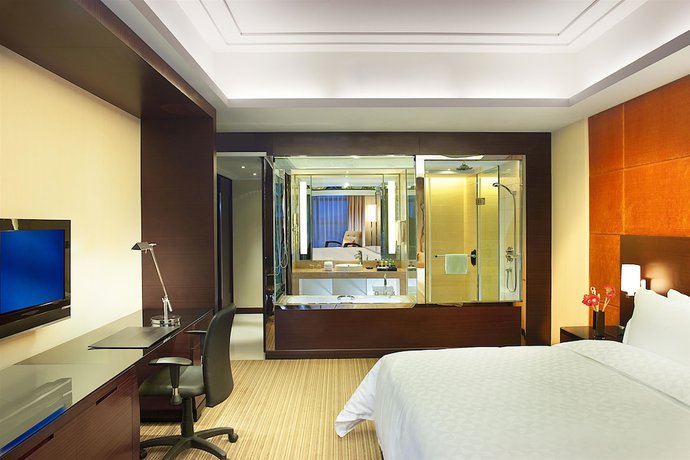 Imagen de la habitación del Hotel Ramada Plaza by Wyndham Lianyungang. Foto 11