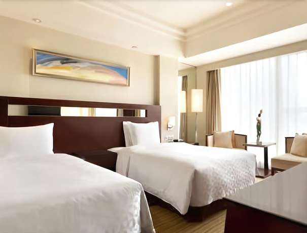 Imagen de la habitación del Hotel Ramada Plaza by Wyndham Lianyungang. Foto 13