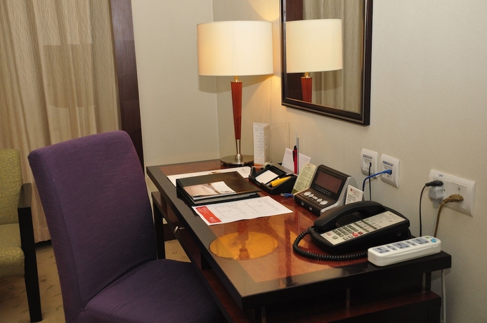 Imagen de la habitación del Hotel Ramada Plaza by Wyndham Pudong. Foto 2