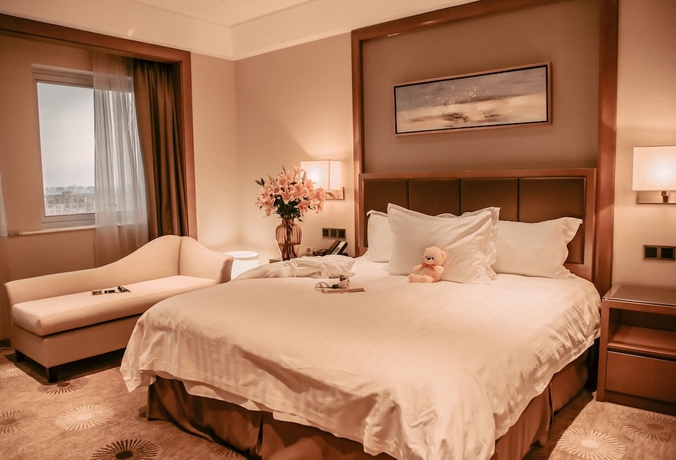 Imagen de la habitación del Hotel Ramada Plaza by Wyndham Pudong. Foto 5