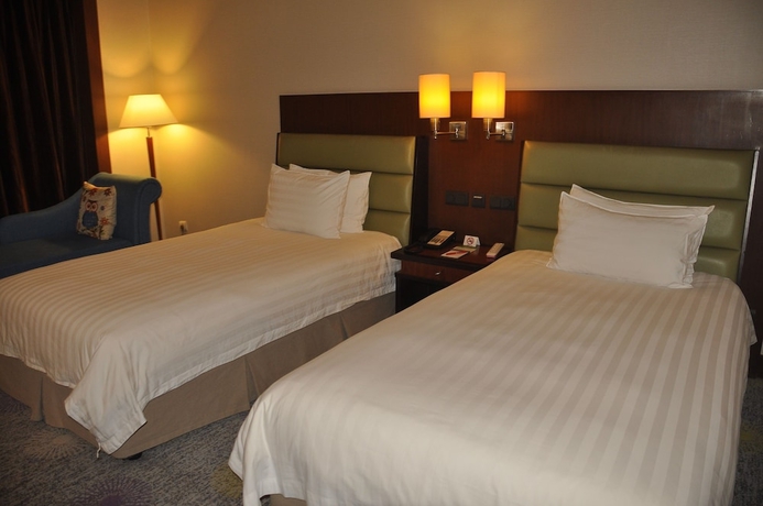 Imagen de la habitación del Hotel Ramada Plaza by Wyndham Pudong. Foto 10