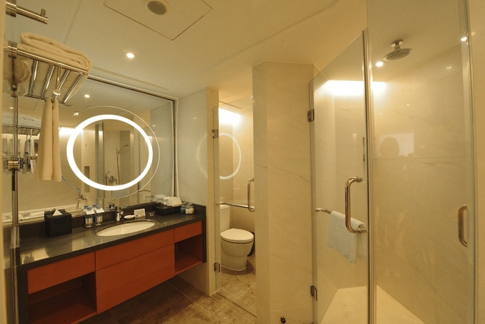 Imagen de la habitación del Hotel Ramada Plaza by Wyndham Pudong. Foto 12