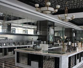 Imagen del bar/restaurante del Hotel Ramada Plaza by Wyndham Qiandeng Kunshan. Foto 8