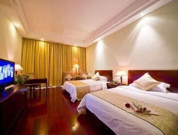 Imagen de la habitación del Hotel Ramada Plaza by Wyndham Sino Bay Shanghai. Foto 4
