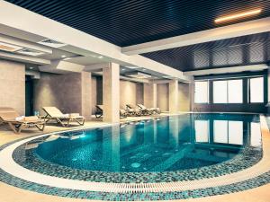 Imagen de los interiores del Hotel Ramada Plaza by Wyndham Tashkent. Foto 15