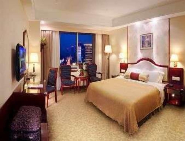 Imagen de la habitación del Hotel Ramada Plaza by Wyndham Tian Lu Hotel Wuhan. Foto 2
