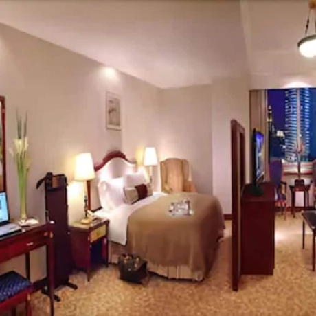 Imagen de la habitación del Hotel Ramada Plaza by Wyndham Tian Lu Hotel Wuhan. Foto 3