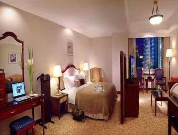 Imagen de la habitación del Hotel Ramada Plaza by Wyndham Tian Lu Hotel Wuhan. Foto 4