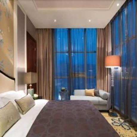 Imagen de la habitación del Hotel Ramada Plaza by Wyndham Tian Lu Hotel Wuhan. Foto 6