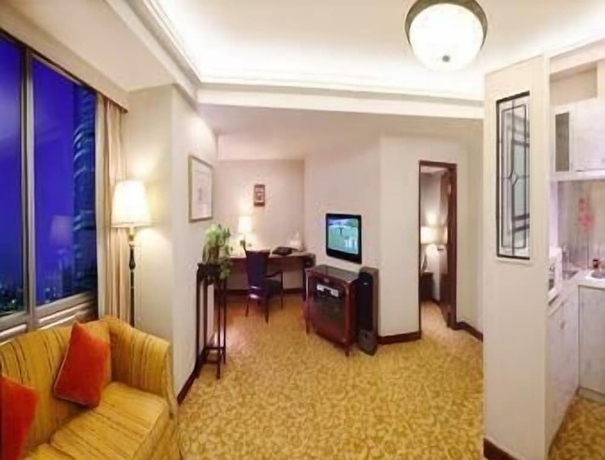 Imagen de la habitación del Hotel Ramada Plaza by Wyndham Tian Lu Hotel Wuhan. Foto 12