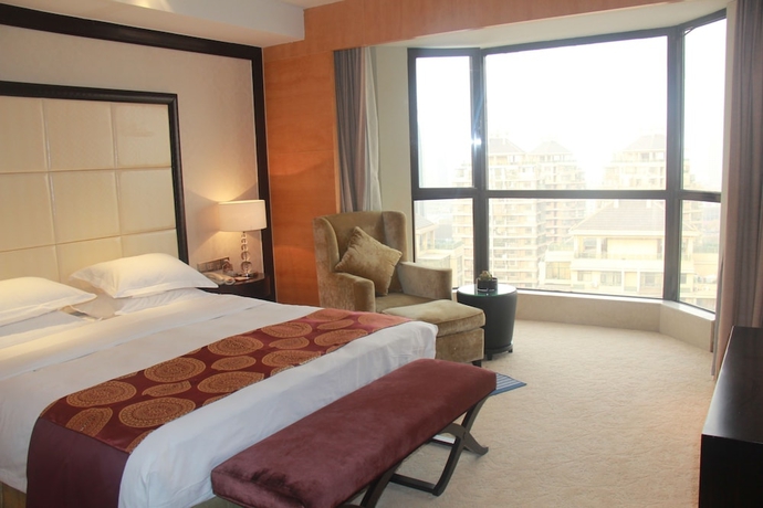 Imagen de la habitación del Hotel Ramada Plaza by Wyndham Weifang. Foto 3