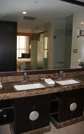 Imagen de la habitación del Hotel Ramada Plaza by Wyndham Weifang. Foto 5
