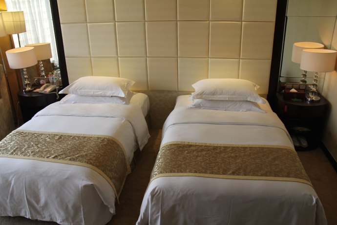 Imagen de la habitación del Hotel Ramada Plaza by Wyndham Weifang. Foto 10
