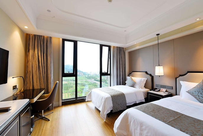 Imagen de la habitación del Hotel Ramada Plaza by Wyndham Wenzhou. Foto 2