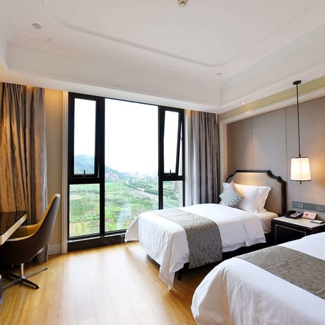 Imagen de la habitación del Hotel Ramada Plaza by Wyndham Wenzhou. Foto 3