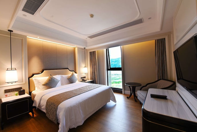 Imagen de la habitación del Hotel Ramada Plaza by Wyndham Wenzhou. Foto 4