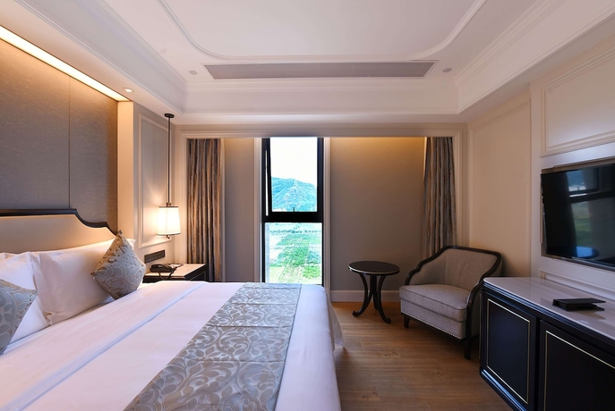 Imagen de la habitación del Hotel Ramada Plaza by Wyndham Wenzhou. Foto 6