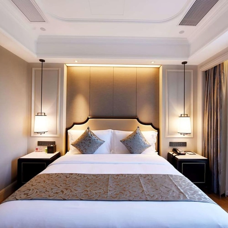 Imagen de la habitación del Hotel Ramada Plaza by Wyndham Wenzhou. Foto 7