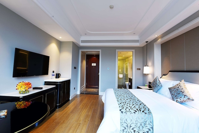 Imagen de la habitación del Hotel Ramada Plaza by Wyndham Wenzhou. Foto 8