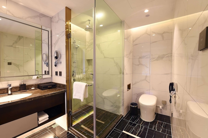 Imagen de la habitación del Hotel Ramada Plaza by Wyndham Wenzhou. Foto 9