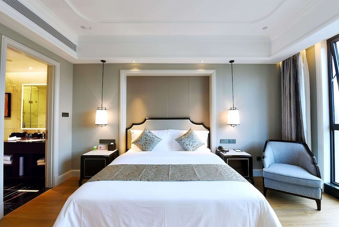 Imagen de la habitación del Hotel Ramada Plaza by Wyndham Wenzhou. Foto 10