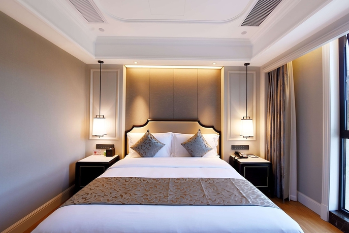Imagen de la habitación del Hotel Ramada Plaza by Wyndham Wenzhou. Foto 11