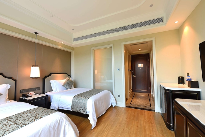 Imagen de la habitación del Hotel Ramada Plaza by Wyndham Wenzhou. Foto 13