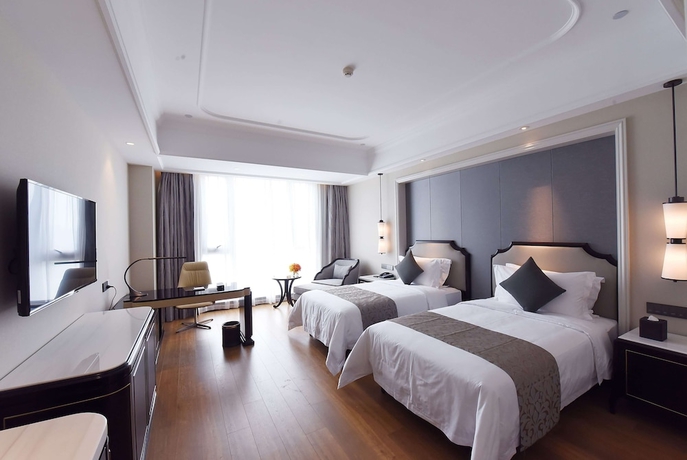 Imagen de la habitación del Hotel Ramada Plaza by Wyndham Wenzhou. Foto 14