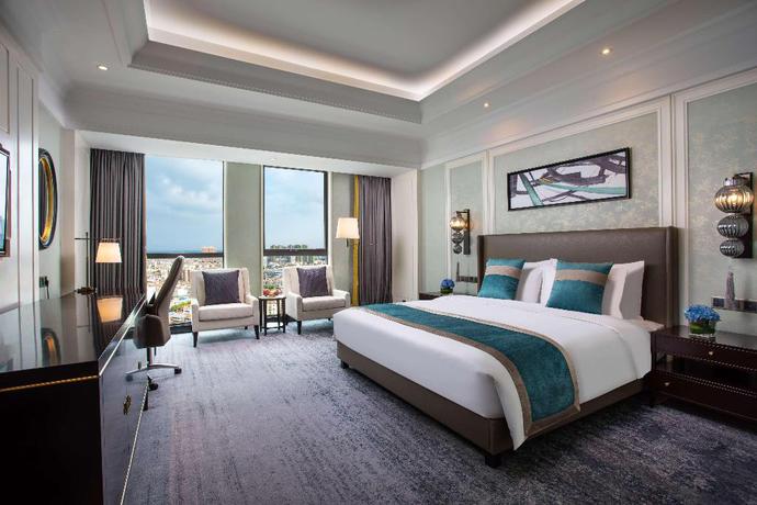 Imagen de la habitación del Hotel Ramada Plaza by Wyndham Wuhan Huangpi. Foto 10