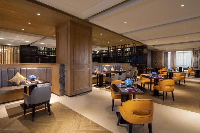 Imagen del bar/restaurante del Hotel Ramada Plaza by Wyndham Wuhan Huangpi. Foto 4