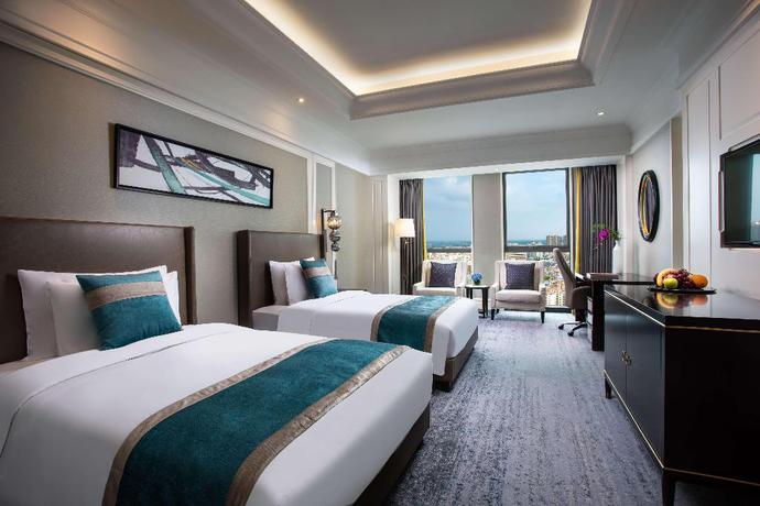 Imagen de la habitación del Hotel Ramada Plaza by Wyndham Wuhan Huangpi. Foto 13