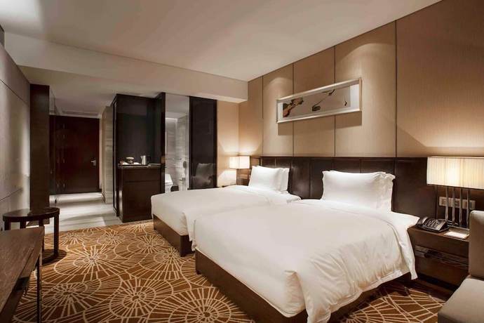 Imagen de la habitación del Hotel Ramada Plaza by Wyndham Xian South. Foto 11
