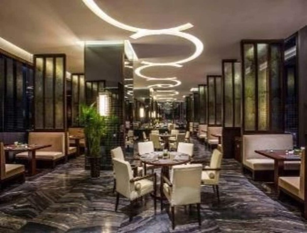 Imagen del bar/restaurante del Hotel Ramada Plaza by Wyndham Xian South. Foto 8